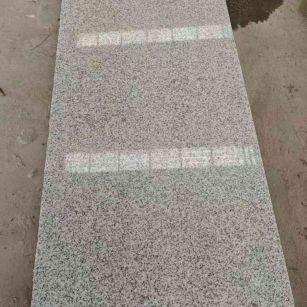 郑州芝麻白光面毛板