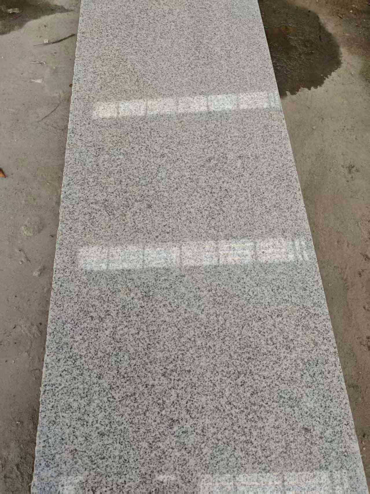 郑州芝麻白光面毛板